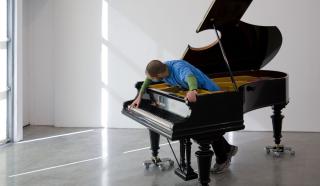 Allora & Calzadilla, Stop, Repair, Prepare: Variations on Ode to Joy for a Prepared Piano, 2008, Prepared Bechstein piano, pianist (Amir Khosrowpour, depicted), 101.5 x 165 x 215 cm, Photo: David Regen, © Allora & Calzadilla, courtesy Gladstone Gallery, New York and Brussels