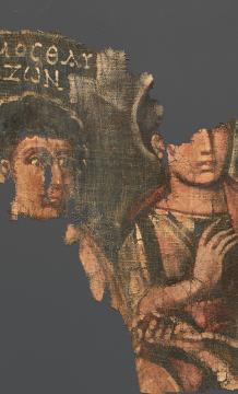 Textile fragment showing two people