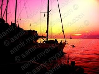 Sunset. Ships at Rovjni. Croatia