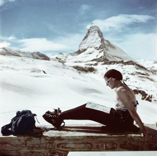 Zermatt. SWITZERLAND. 1950. Skier sunbathing in front of the Matterhorn. © Robert Capa © International Center of Photography/Magnum Photos