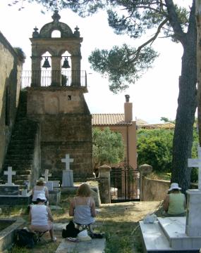 students sketching old church ruins