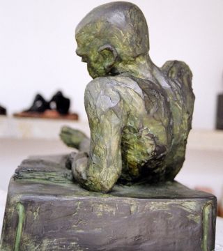 Man Reading (back view)